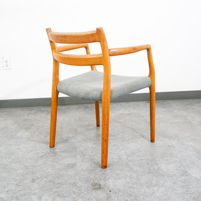 Iconic dining chair designed by Niels Otto Møller in 1950s, model 67 Armchair in oak. The chairs feature a solid oak frame...