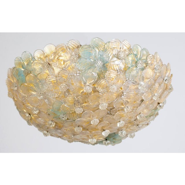Pair of amazing Mid-Century Modern hand blown Italian flush mount or ceiling light featuring overlapping crystal flowers,...