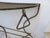 This iron garden console is good for placing potted flowers or plants. It measures 33.5"H x 49"L x 12"D at the top and...