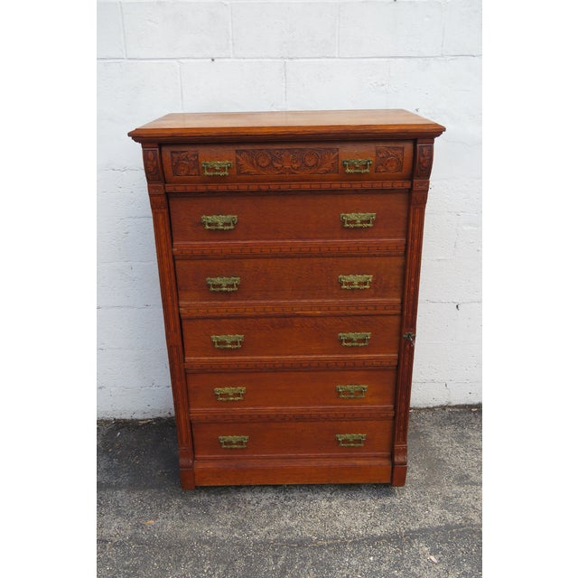This brilliant Chest of Drawers is made of wood, solid wood, oak, solid tiger oak, and brass. This extraordinary Victorian...