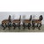 Set of four French embossed leather armchairs upholstered in a leather that resembles crocodile. Great set of petite...