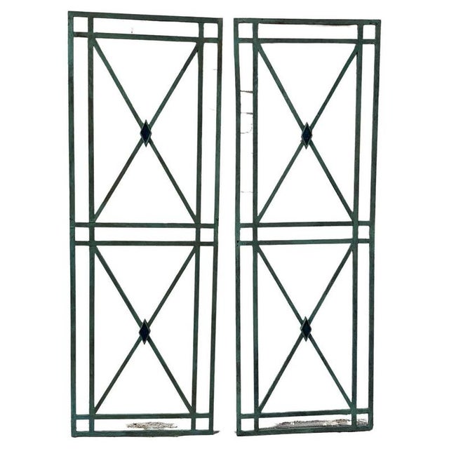 French Directoire style bronze wall mounted panels, the classic X-frame panels with central diamond made from molten...