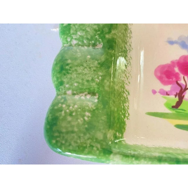 This Butter dish is made of ceramic. It is in the style of Majolica. Made in France in the 1950s. It is made of white and...