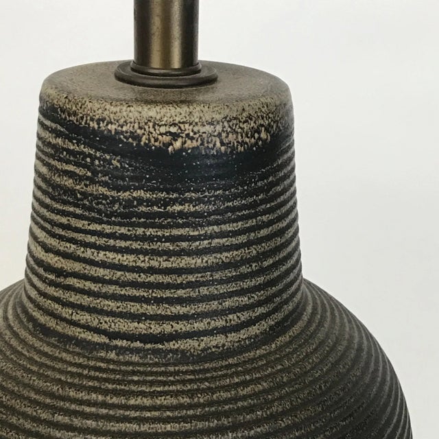 Classic Lee Rosen Design Technics bottle form ceramic table lamp. Dramatically stripped ombre glaze in matte browns to off...