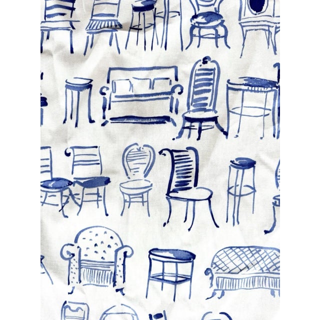 Striking vintage Spectrum decorator fabric featuring a crisp blue and white novelty chair print in a playful mid-century...