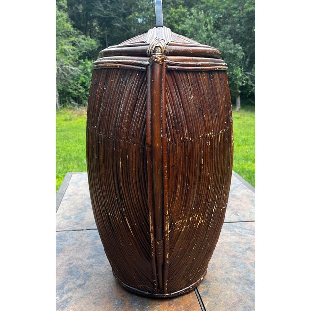 A striking statement piece showcasing exceptional mid-century coastal design and craftsmanship. Woven from dense, natural...