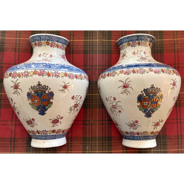 Bring Old World charm to your walls with this rare pair of large vintage Italian majolica wall vases, beautifully...