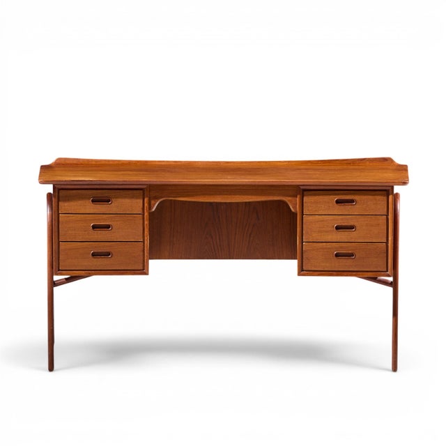 Svend Madsen Mid Century Danish Teak Curved Desk This desk measures: 59 wide x 28.5 deep x 30.25 high, with a chair...