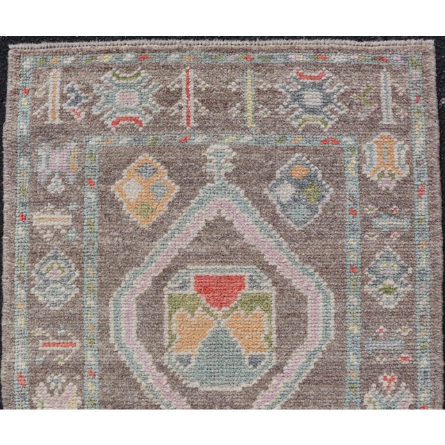 Measures: 2'4 x 3'4 Small Turkish Oushak Rug with Soft Brown Ground and Geometric Pastel Motifs. Keivan Woven Arts. rug...