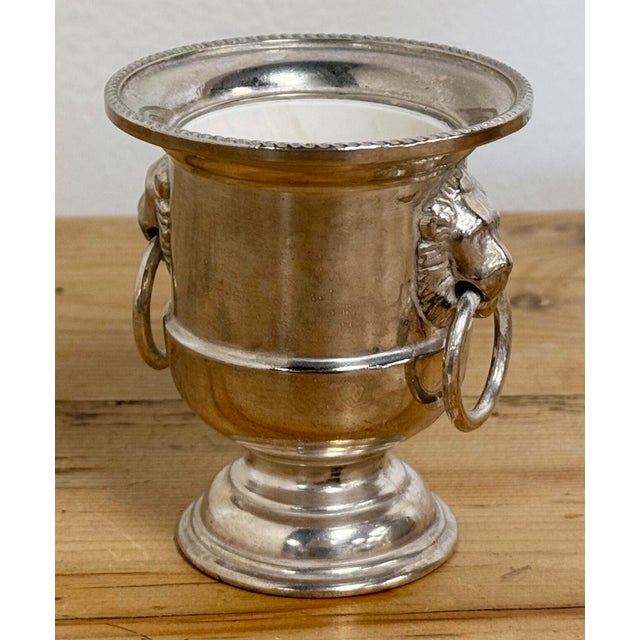 Vintage silver plate hors d'oeuvres stick, toothpick holder or matchstick holder. Silver plating with lion head handles to...