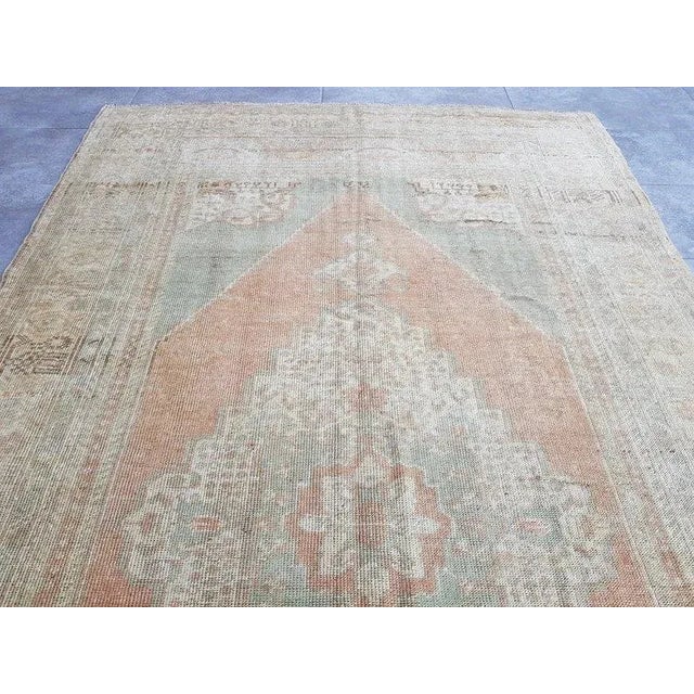 This is a vintage Turkish handwoven Anatolian OUSHAK rug. We collect Vintage rugs from Anatolia, which is the eastern part
