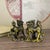 This striking pair of gilt bronze statues depicts Qilin, mythical hooved creatures from traditional folklore, captured in...