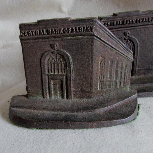 A nice set of Antique Architectural, Banking Bookends. The bookends are made of cast iron and are advertising for the...