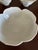 A set of four 1970s white lotus bowls, shaped like a lotus flower in full bloom. Each bowl has softly scalloped petals...