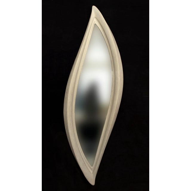 Mirror No. 4 is a large-scale wall-mounted mirror object designed by Chris Delmar. Its tall, narrow form combines a...