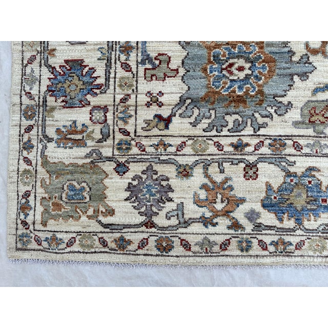 Oushak Handmade Wool Rug With Ivory and Blue Floral Pattern For Sale - Image 4 of 5