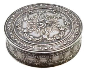 Circular Silver Box with Floral Reliefs and Hinged Lid