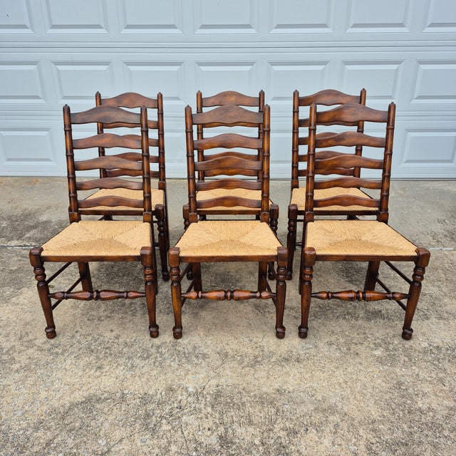 This is a set of 6 ladder back rush seat dining chairs from Theodore Alexander's 2019 Castle Bromwich Collection. The...