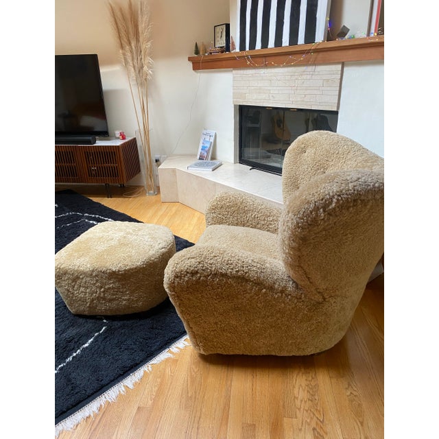 This iconic “Tired Man” lounge chair and ottoman set by Flemming Lassen for Audo Copenhagen is a statement of timeless...