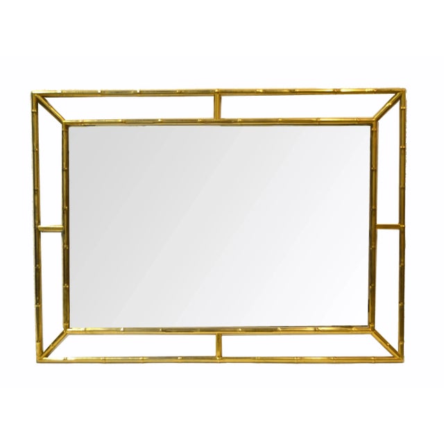Mid Century Modern Brass Faux Bamboo Wall Mirror made in Italy late 70s. Can be hung horizontal. Light Foxing to Mirror...