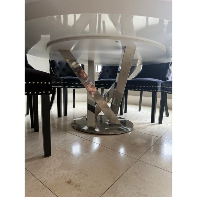 I use this set in my kitchen but it’s big enough to be a regular dining table. It’s in great shape, the Lazy Suzan has...