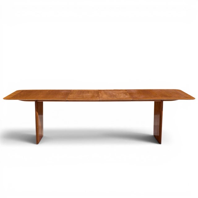 Robsjohn Gibbings for Widdicomb Mid Century Walnut Expanding Dining Table with 2 Leaves This table measures: 69.75 wide x...