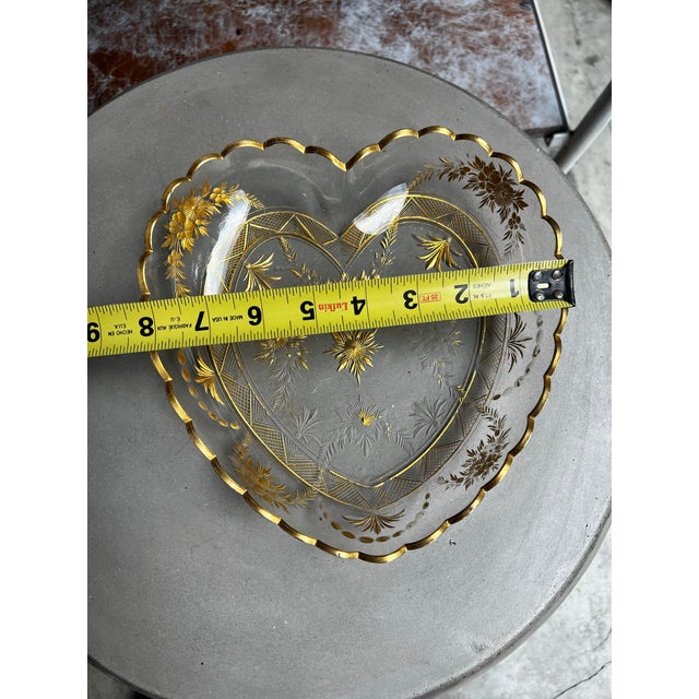 Up for consideration is a beautiful vintage 24kt gold heart shaped glass platter. This would look lovely in your home, and...