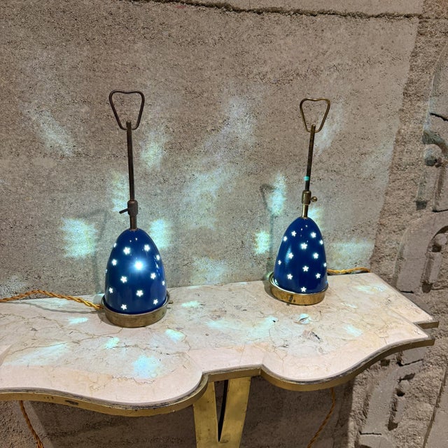 AMBIANIC presents 1950s Angelo Lelii Italian Blue Stelline Table Lamps Arredoluce Brass body aluminum shades painted blue....