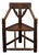 Early 20th Century English Turn of the Century Oak Corner Chair with Carved Geometric Back Splat For Sale