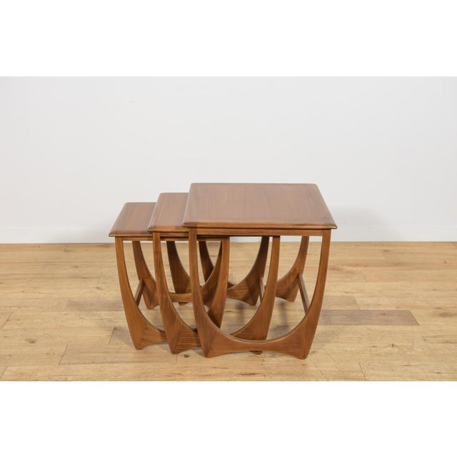 This set of three teak nesting tables was designed by Victor B. Wilkins for the British furniture manufacturer G-Plan...