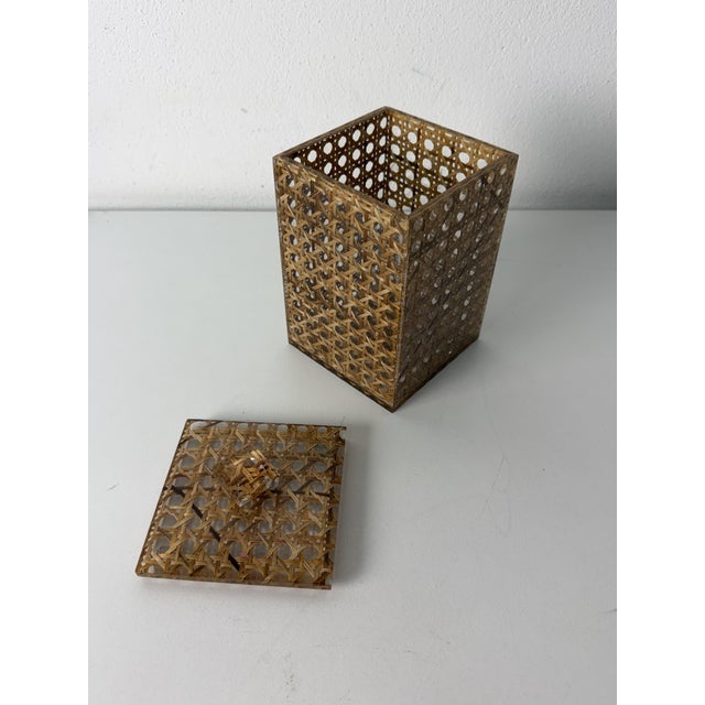 Mid-century Italian acrylic glass and rattan box in the style of Christian Dior, 1970 Measures 10 cm x 10 cm x 17 cm (H)...