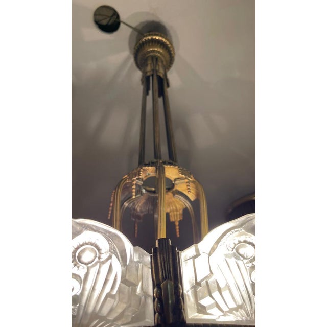 Georges Leleu was a prominent French designer renowned for creating Art Deco chandeliers during the early 20th century,...