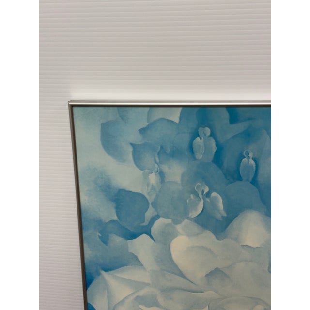 Design Plus Gallery presents Georgia O’Keeffe "White Rose With Larkspur No. 2" framed Museum of Fine Arts Print. Rendered...