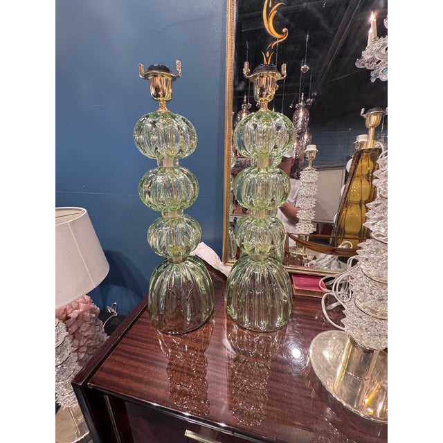 These Pair of Murano Green Glass Lamps feature elegant designs that add a touch of sophistication to any living room. The...