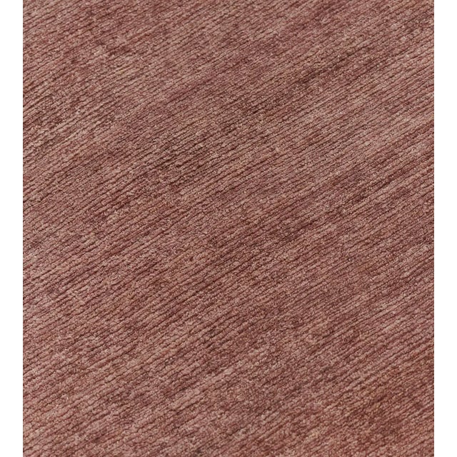 Part of the Mansour Modern collection, this soft hemp rug is finely woven in delicate high-low stripes by master weavers...