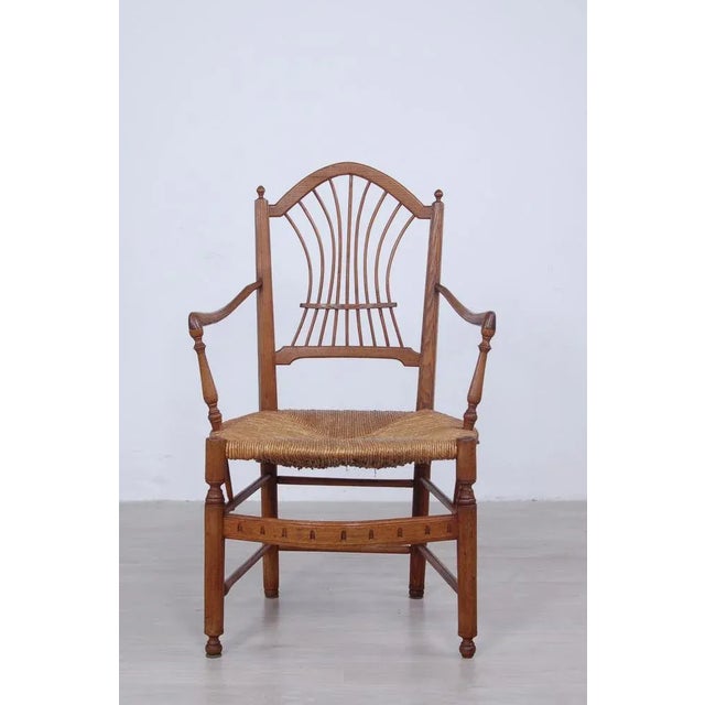 Provençal chair, original production of late 19th century. Well crafted oak wood frame, with armrests. Stuffed seat....