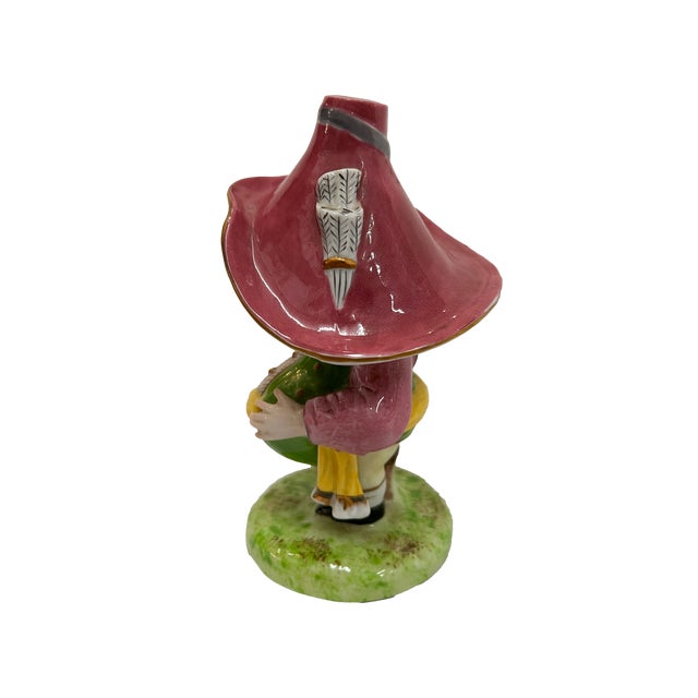 These decorative accents feature a charming, "pot-bellied" silhouette with exaggerated features. The most striking feature...