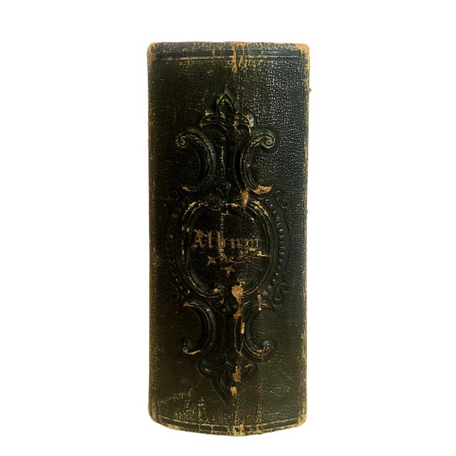 On offer is an authentic Victorian family photograph album dating precisely to the Civil War or early post-Civil War era...