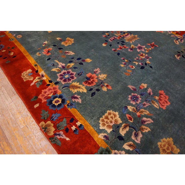 Tranquil and Calming Light Blue Background With Warm Red Field and Magnificent Array of Multicolored Floral Motifs Antique Chinese Art Deco Rug For Sale - Image 11 of 15