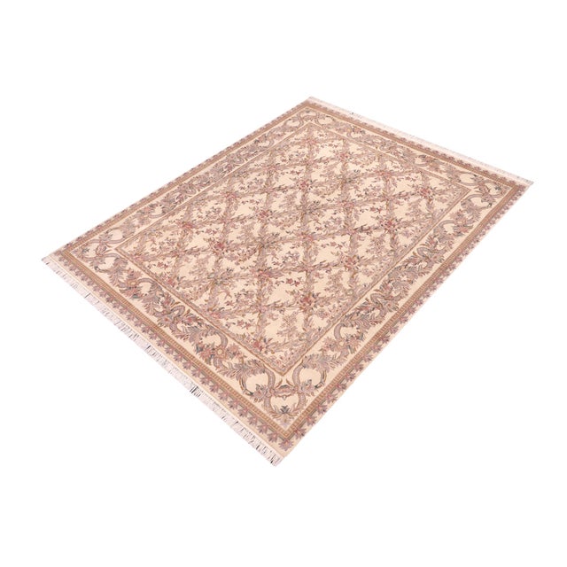 Designed with mesmerizing intricacy and gorgeous color palette, this hand-knotted masterpiece demonstrates the beauty and...