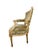 A handsome vintage armchair drawing directly from the neoclassical vocabulary of Louis XVI furniture, pairing a carved...