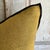 Color: Ocre; a deeper mustard yellow with brown tones, linen textured style pillow with a stitched edge, metal zipper...