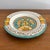 Italian hand-painted ceramic ashtray, traditionally colored in teal, orange, and yellow. Most items found at Pub & Oasis...
