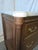 Add neoclassical elegance to your space with this finely crafted Louis XVI-style French commode, featuring a rich mahogany...