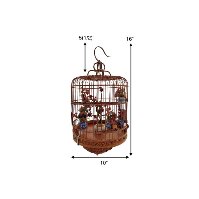 This vintage original artwork, meticulously crafted by Chinese artisans, showcases an intricately carved wooden birdcage...