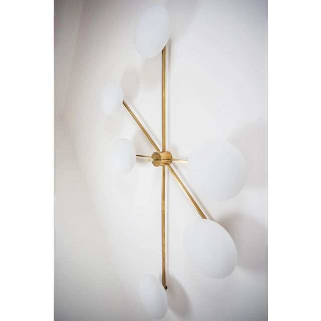 The Stella Tribute Wall / Ceiling Light brings elegance to midcentury design through the inspiration of Italian design -...