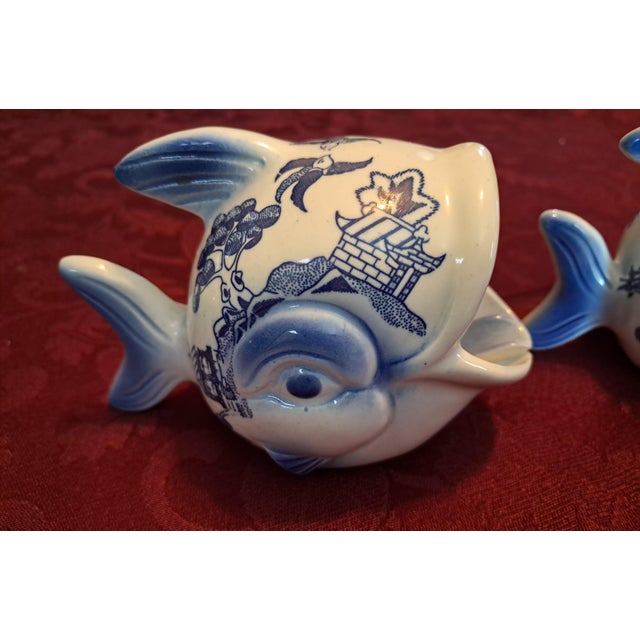 This lovely pair of blue willow personal ashtray fish shaped. Tongue of fish is a cigarette holder. Great decor for your...