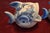 This lovely pair of blue willow personal ashtray fish shaped. Tongue of fish is a cigarette holder. Great decor for your...