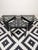Great little set of 3 ebonized triangular tables with smoked glass by Porada Arredi. Bottom of each table has tongue and...