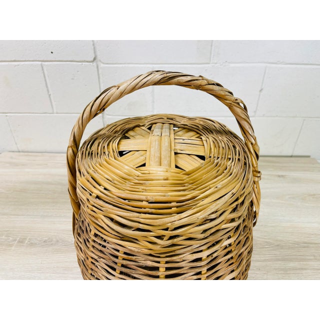 Rustic Vintage Round Covered Wicker Basket With Handles For Sale - Image 3 of 11